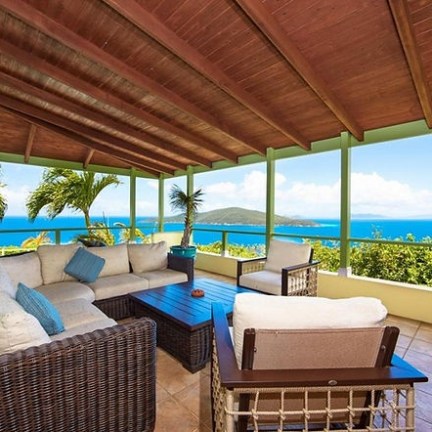 a room filled with furniture and a large window