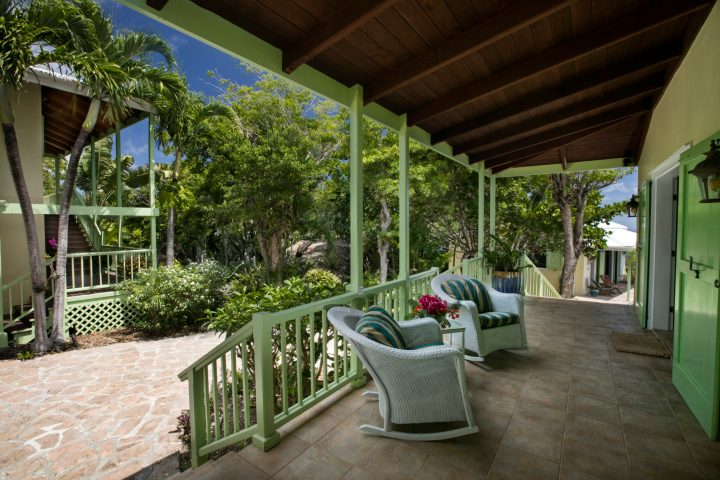 a chair sitting in front of a building