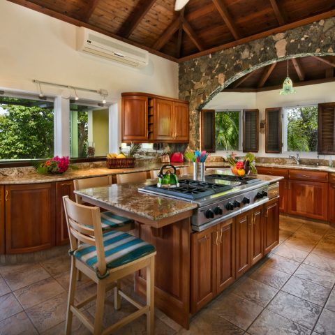 a kitchen with a large window