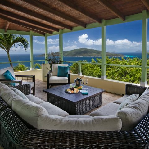 a bedroom with a bed and chair